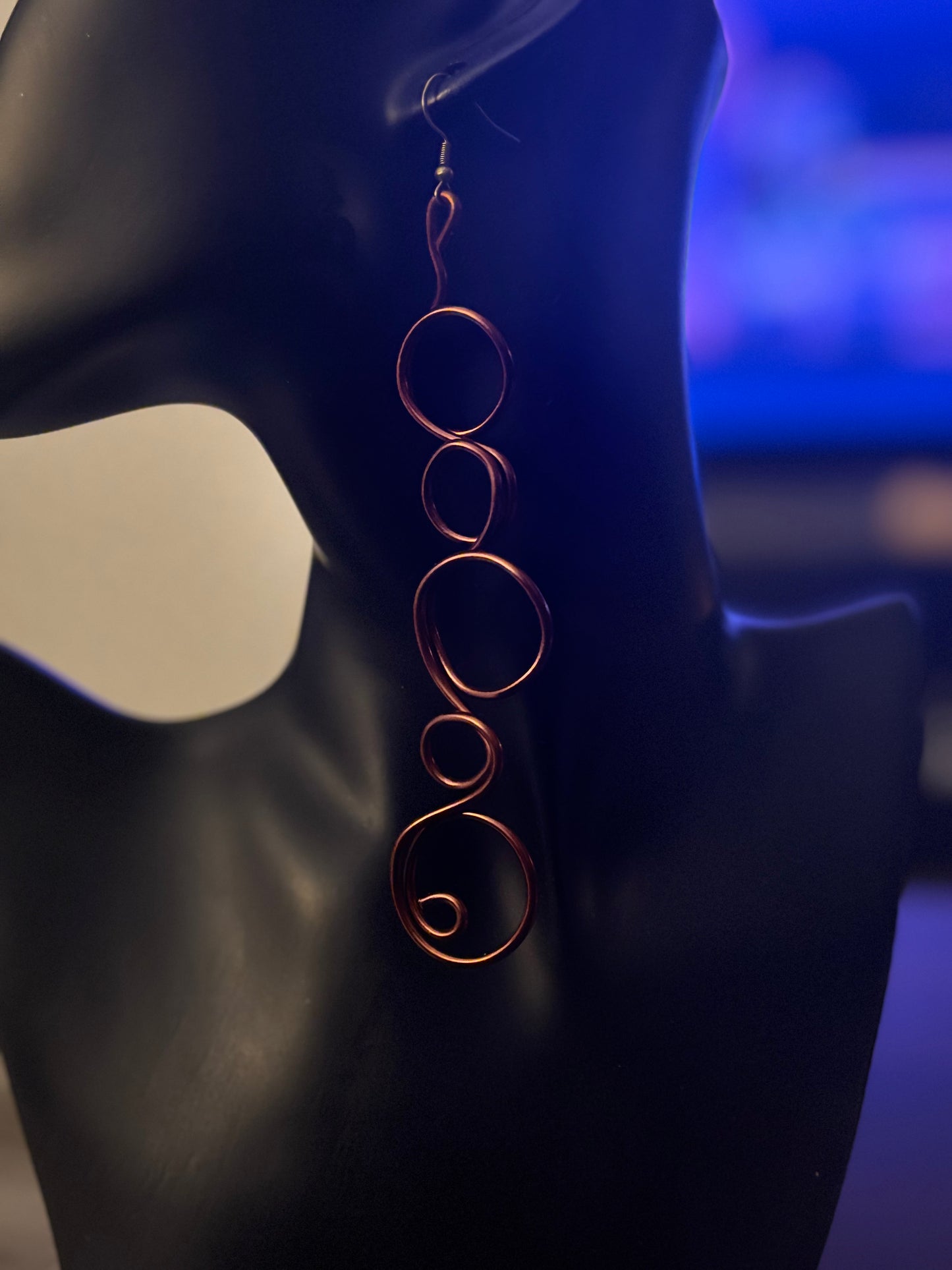 This earring is worn by a woman who does not as for space- she claims it.