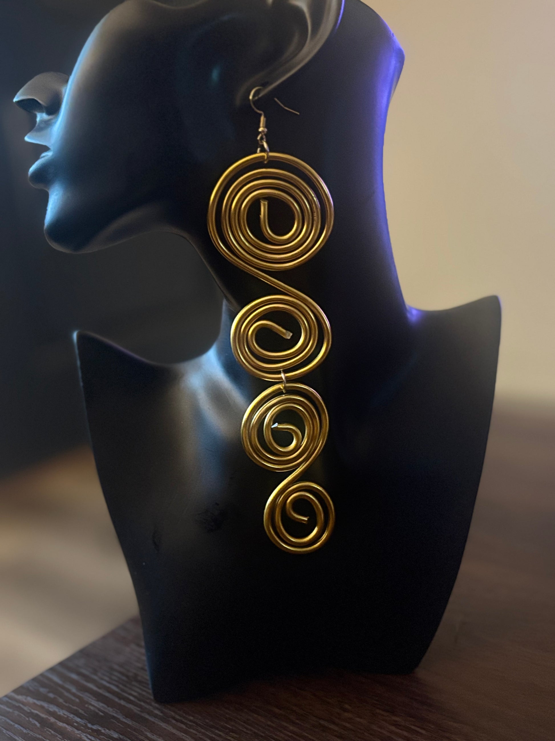 This earring speaks to a woman who understands that adornment is not a decoration, it is identity, energy, and presence. 