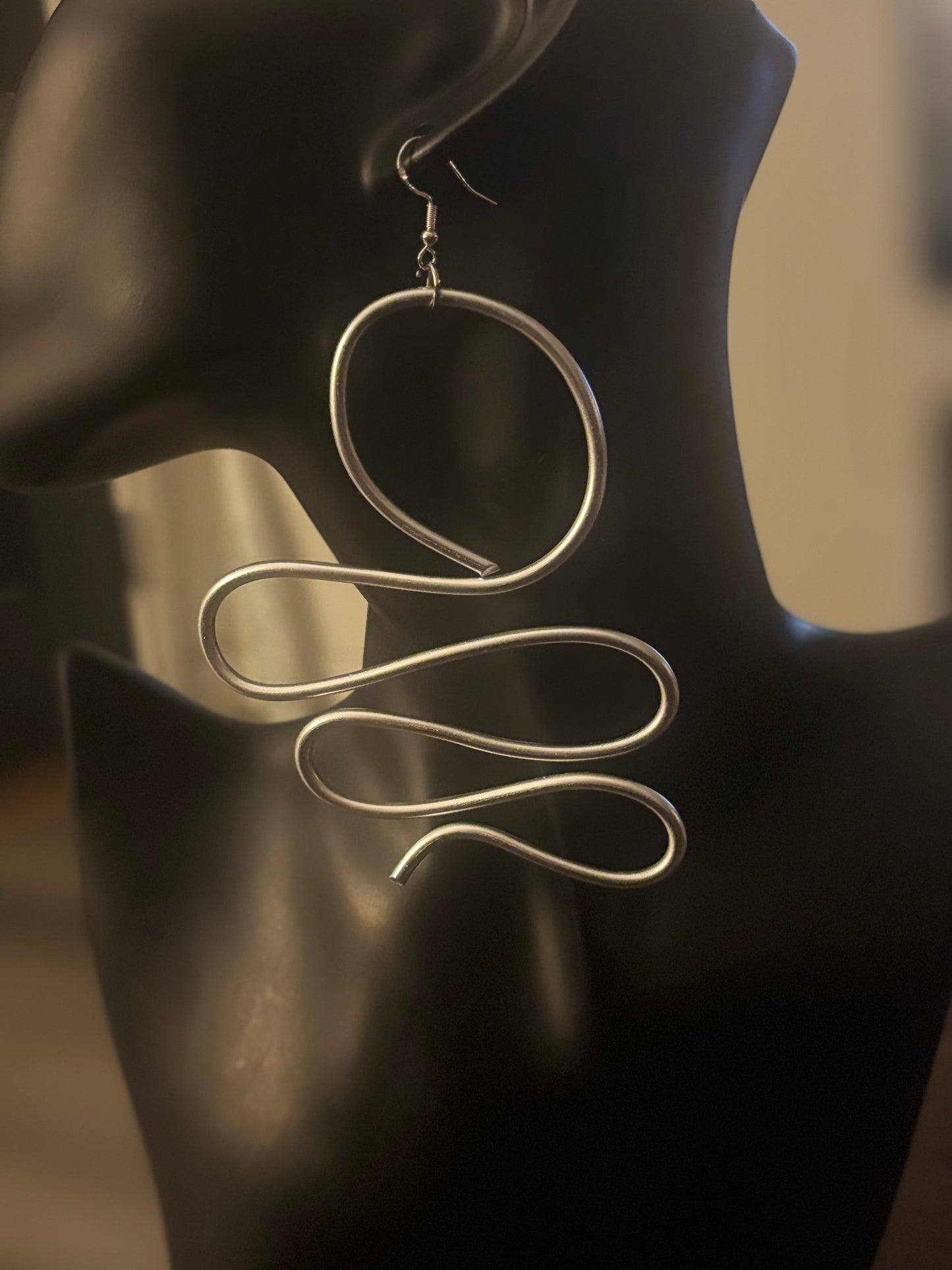 This earring belongs to a woman who understands that freedom is the most powerful form of elegance. 