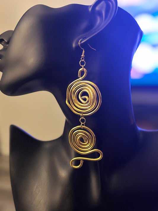 This earring is worn by a woman who knows who she is and moves accordingly. 